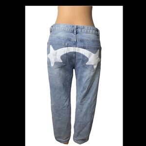 Women’s Light Blue Denim Jeans with White Star Pocket Detail